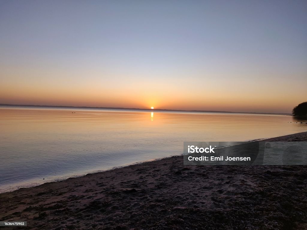 Sunrise Sunrise on the beach an early winter morning Backgrounds Stock Photo