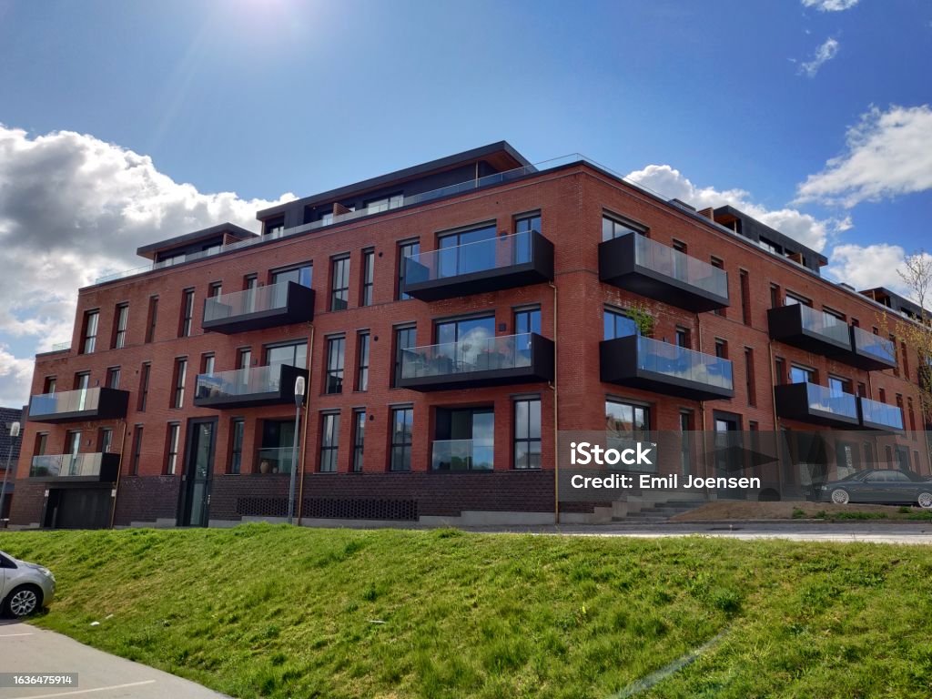 Modern building Modern building by harbour Apartment Stock Photo
