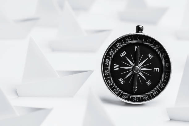 istock White Paper Boats With Compass 1636481279