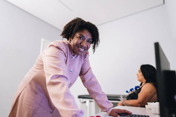 istock Portrait of a female doctor using computer on a doctor's office 1636485100