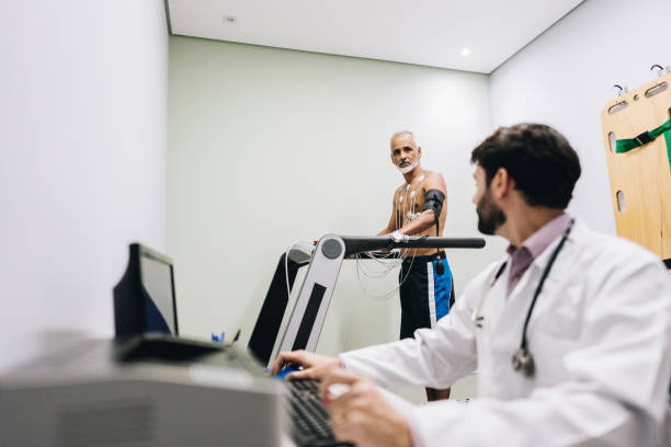 istock Senior patient talking with her doctor while take cardiopulmonary stress test on a doctor's office 1636487190