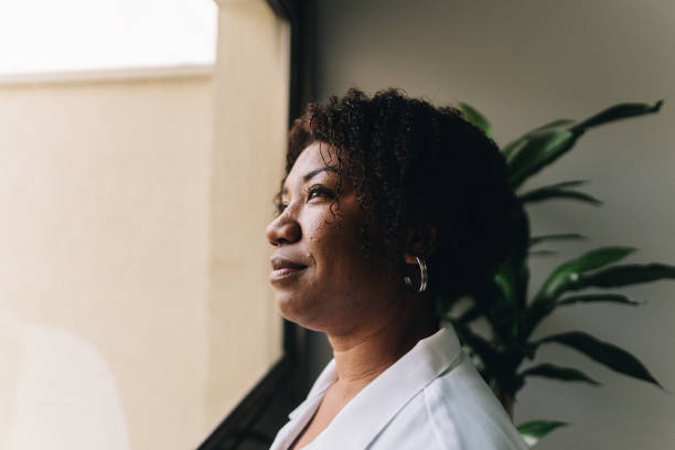 istock Female doctor contemplating on a doctor's office 1636489305