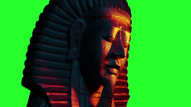 Egyptian King Statue Lit Up In Firelight Greenscreen