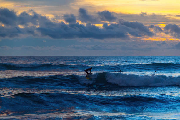 istock Catching the Wave, Beach Sunset in Costa Rica 1636513378