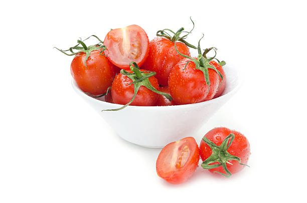 istock wet cherry tomatoes in a white bowl isolated 163652272