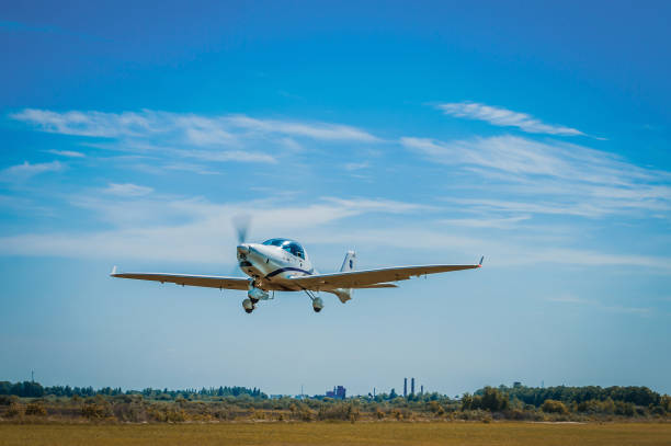 istock The plane takes off from the grass 1636525158