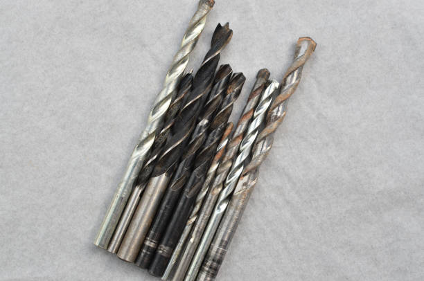 istock Close-up of drills ready for work, representing efficiency in construction. Set of close-up drills, perfect for representing precise work in the field of construction. 1636541052