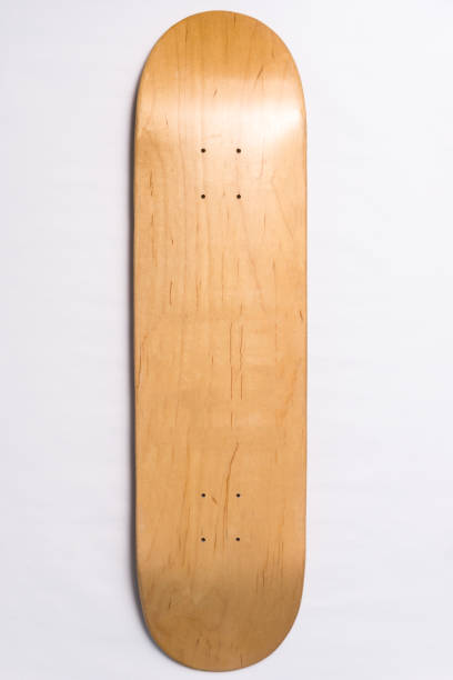 istock Blank skateboard deck isolated on white background. Wooden board 1636542637