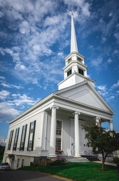istock Stowe Community Church with American Flag 1636546228