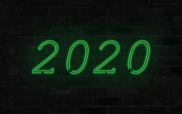 istock Green 2020 neon sign on 1636575360