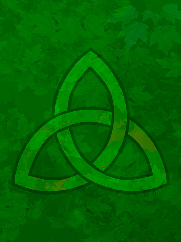 Celtic Knot on Green Leaves Background - Irish Religious Symbol - trefoil knot - triquetra