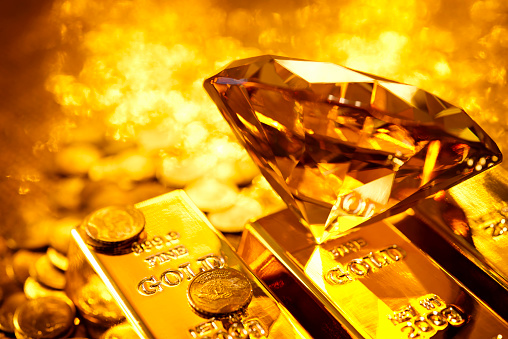 Amber Diamond On Gold Bars Stock Photo - Download Image Now