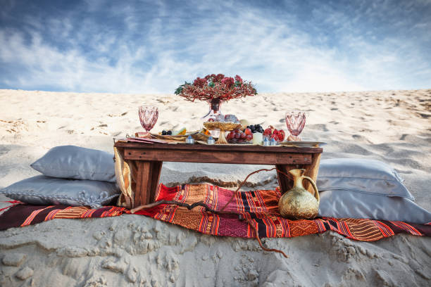 istock Wedding table bohemian style decoration on the beach 1636635210