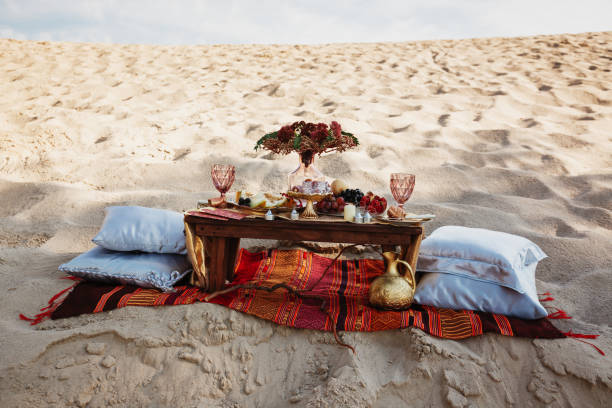 istock Wedding table bohemian style decoration on the beach 1636635723