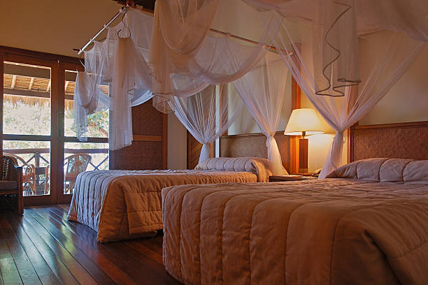 istock Bed with Mosquito net in Resort hotel 163668536