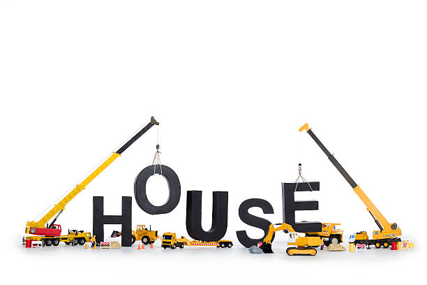 istock House under construction: Machines building house-word. 163668657
