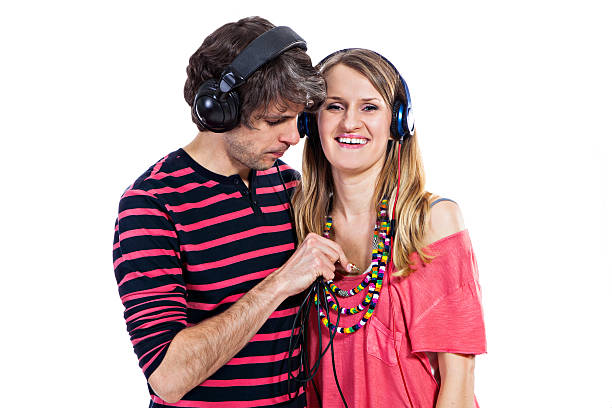istock Couple with headphones 163669475