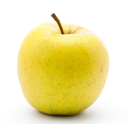 Yello apple on white background