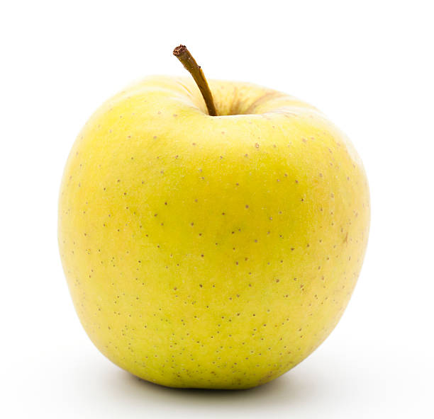 Yellow Golden apple Yello apple on white background aluxum stock pictures, royalty-free photos & images