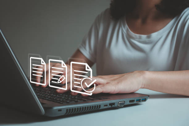 istock Business performance checklist, businesswoman using laptop doing online checklist survey, filling out digital form checklist, take an assessment, questionnaire, evaluation, online survey, online exam. 1636700215