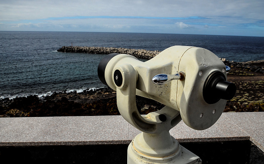 Coin Operated Telescope For Beach Observation, Blue Sky And Clouds
