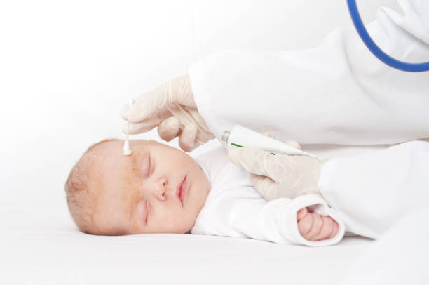 istock Baby to the dermatologist 163674327