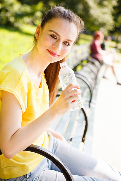 istock Woman with Water Bottle in Park 163674331