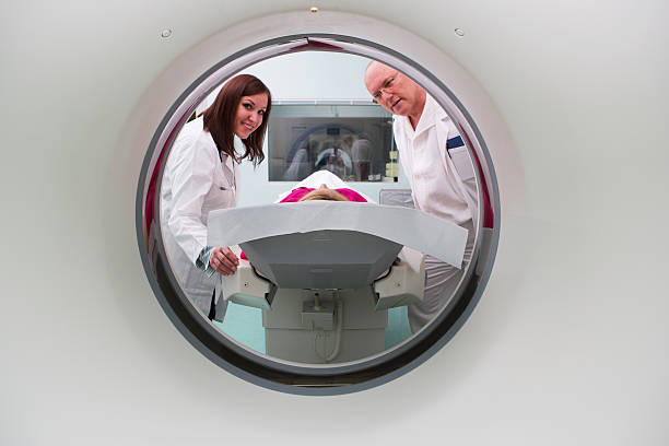 istock Young woman patinet waiting for CAT scan 163674371