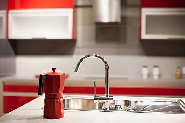 istock Modern kitchen counter top, faucet,coffe machine and washbasin 163674387