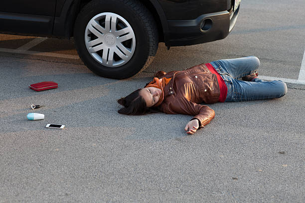 istock Traffic accident..young woman hit by a car 163674400