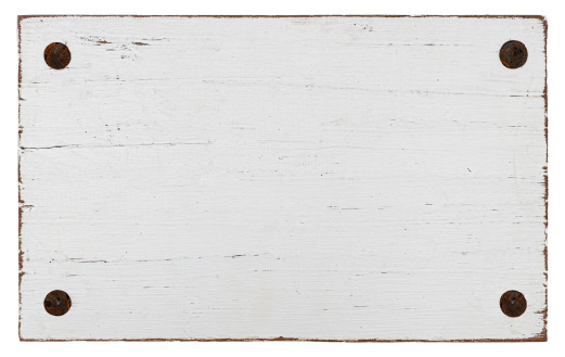 White grunge wood board with four old bolts. Isolated on white, clipping path included, composite image.