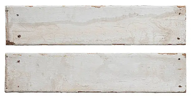 Photo of Two old white weathered wood boards.