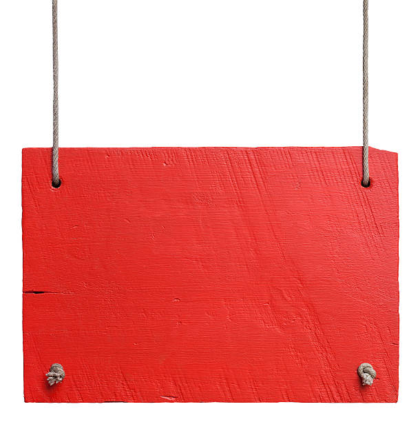Old red weathered white wood signboard. Old weathered red wood signboard, hanging by old rope, high resolution, composite image, isolated on white, clipping path included. hanging signboard stock pictures, royalty-free photos & images