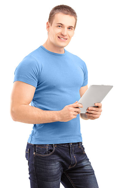 istock Young man holding a tablet and looking at camera 163677138