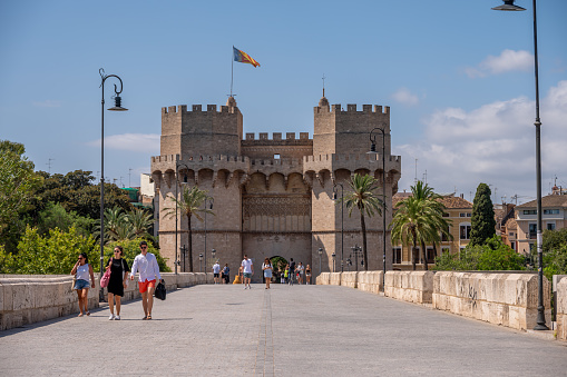 Valencia, Spain - July 25, 2023: The ancient city wall gate on the edge ov Valencia's old town,