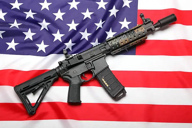 AR-15 (M4A1) custom carbine on the flag of USA