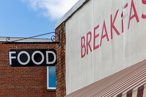 Leonartown, Maryland  A sign on an old brick building above a restaurant says 