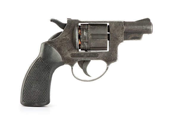 istock Black revolver gun isolated on white background 163690509
