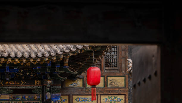 istock Red lantern hanging on traditional building in Pingyao, China 1636913631