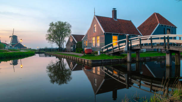 istock sunset at the windmill village Zaanse Schans during Spring in the Netherlands 1636939297