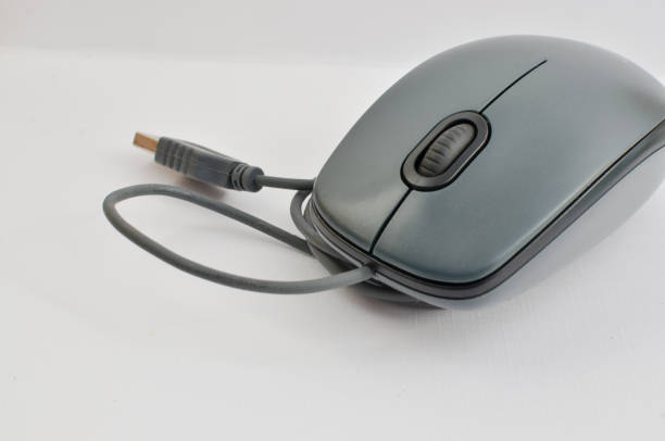 istock Closeup of a computer mouse with modern design, symbol of technology and modern computing. Perfect for technology concepts, symbol of digital age and technology solutions. 1636946184