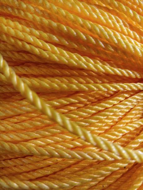 istock Rope reel made of yellow plastic 1636947732