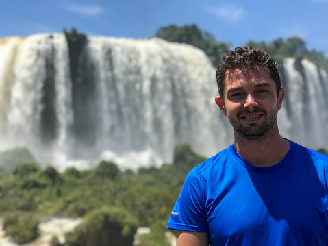 Brazilian man tourist in the Iguassu Falls