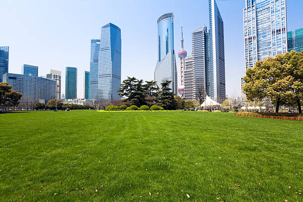 istock city park with modern building background 163700447