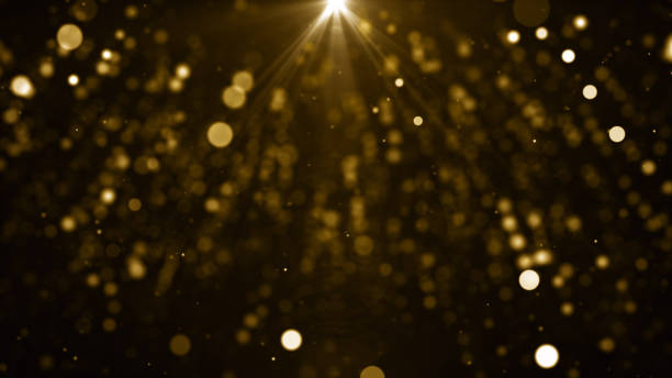 istock Particles gold glitter bokeh award dust abstract background 1637109525