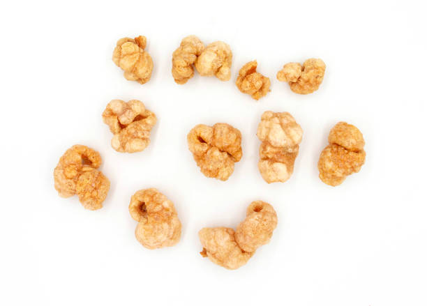 istock isolated pork rinds on white background 1637125861
