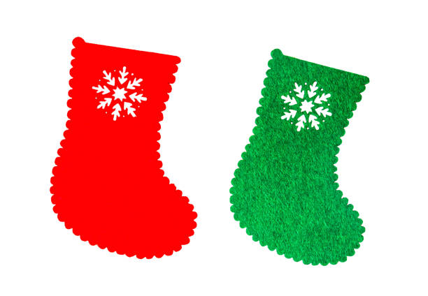 Red and White handmade Christmas stockings isolated on a white background.