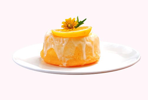 Homemade Lemon Cake on white plate, front view, isolated background