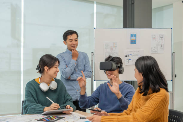 istock Creativity digital development .businessman use VR glasses virtual reality headset for ux developer and ui designer about mobile app interface at modern office 1637140031