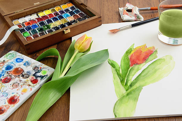 istock painting a tulip with aquarell paintings 163714282